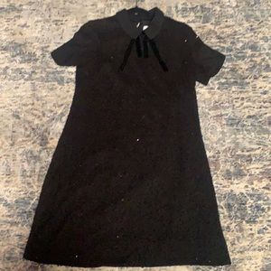 Super cute black dress!! Has sequins spread throughout material!